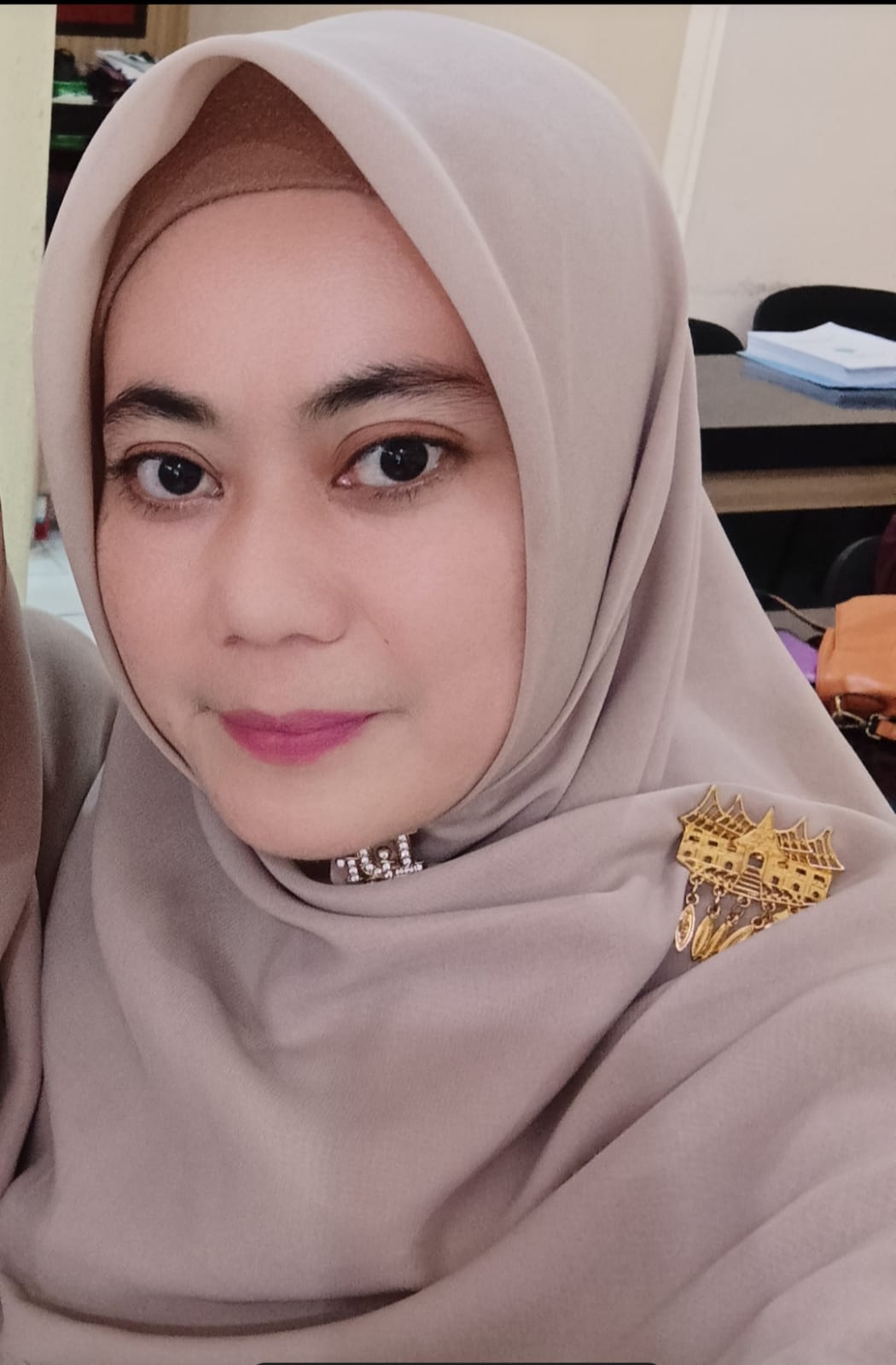 Dewi Kurnia, S.Pd
